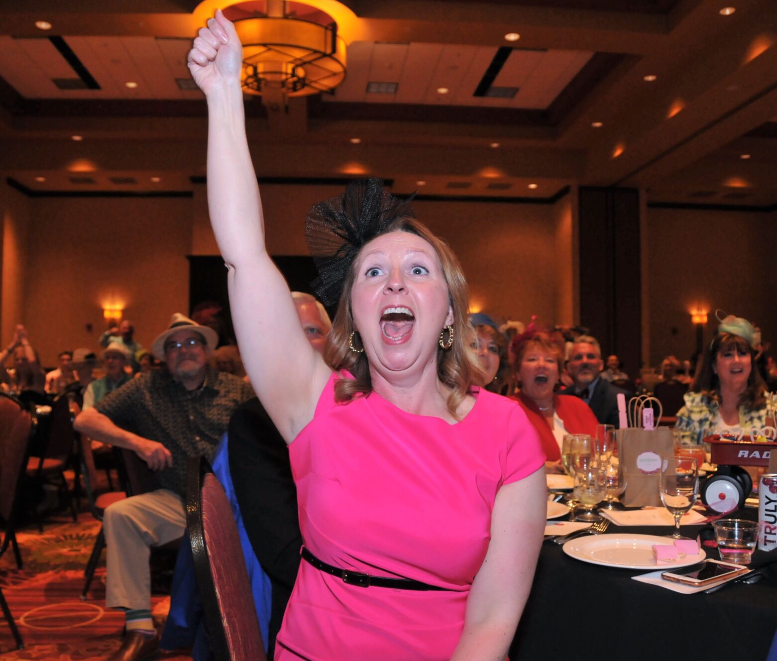 Mary Beth Lowery cheers on her horse